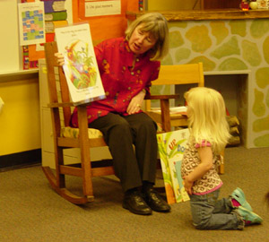 single child listening to book reading